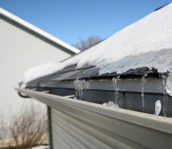 house roof covered with snow