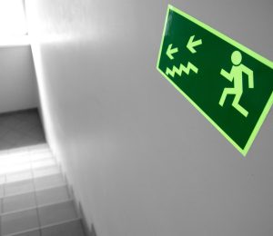 Staircase with a go-slow sign board